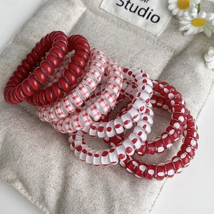 Lot de chouchous spirales rouges à pois pour coiffure queue de cheval haute tendance