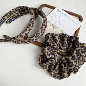 Classic leopard print fabric headband and scrunchie set for elegant hair styling