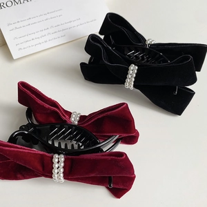 Elegant velvet bow hair clips with pearls for women, available in black and burgundy