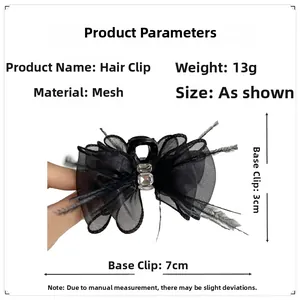 Detail view of black mesh bow hair claw clip showing 7cm length and 3cm height