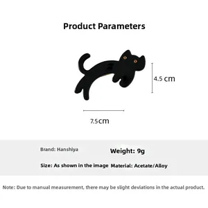 Macro shot of a black cat acetate hair clip with size dimensions 7.5cm x 4.5cm and alloy base