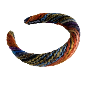 Handmade woven knitted headband with colorful tweed fiber and vintage texture style