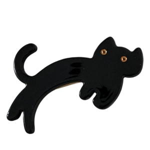 Cute black acetate cat hair clip for women with a sleek polished finish and gold accents