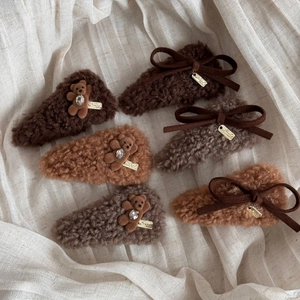 Set of six plush teddy bear and bow hair clips in warm earthy brown tones with rhinestones