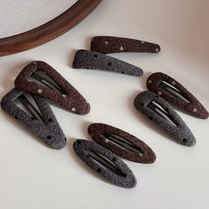 Polka dot wool hair clips set in brown and grey minimalist teardrop design for women