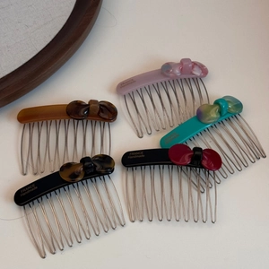 5-piece set of handmade acetate bow hair combs in black, purple, brown and blue