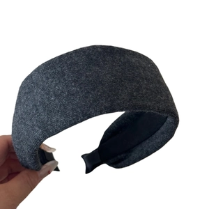 Dark grey thick knitted headband with wide brim and retro fabric texture for autumn and winter
