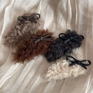 Faux lamb wool hair clips set with leather bows in grey brown black and beige colors