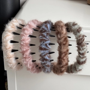 Set of 5 fuzzy winter headbands in assorted colors with non-slip inner teeth detail