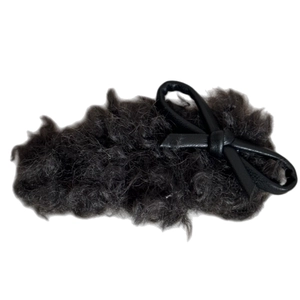 Plush faux shearling hair clip with black PU leather bow detail for women and girls