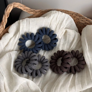 Twill fabric spiral hair ties in blue, grey and coffee tones set of 6 in a woven basket