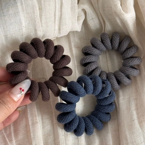 Three-piece set of twill fabric spiral hair ties in dark coffee, grey, and navy colors