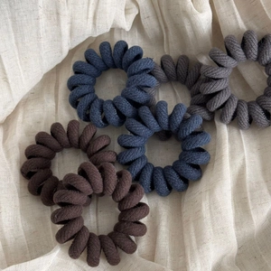 5-piece set of twill fabric wrapped spiral hair ties in earth-toned neutral colors