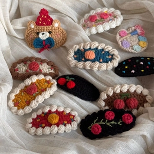 Set of 10 handmade knitted hair clips for kids with cute bear and floral crochet designs