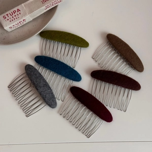 Set of six oval fabric hair combs in assorted vintage colors for elegant French hairstyling