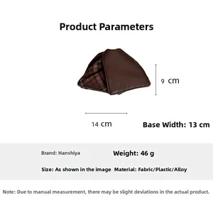 Detailed view of large 14cm faux leather shark hair claw with red plaid fabric inner lining