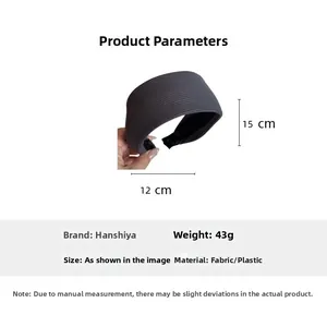 Technical drawing showing the 12cm width and 15cm height of the dark gray knit headband