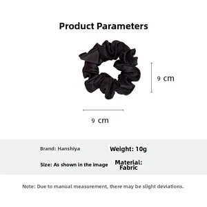 Detail showing 9cm black satin scrunchie with 10g weight and material specifications