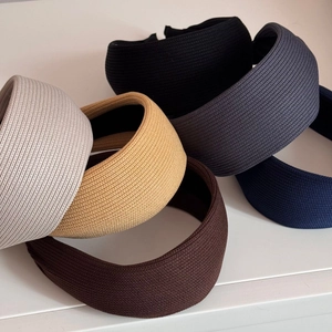 Minimalist knitted striped wide headbands in assorted colors for a chic autumn look