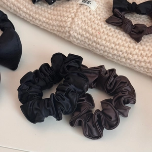 Elegant satin bow scrunchie set in black and dark brown with premium silk texture finish