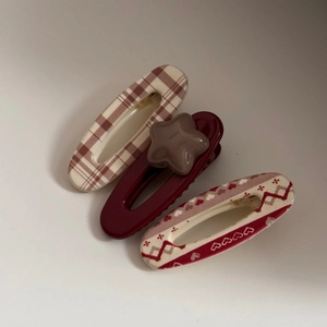 Three-piece acetate hair clip set featuring plaid, star patterns, and heart geometric designs