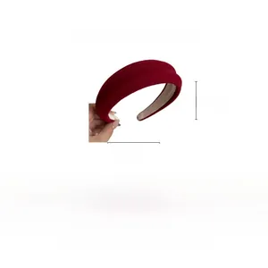 Detail view of burgundy padded headband showing 16cm height and 14cm width dimensions