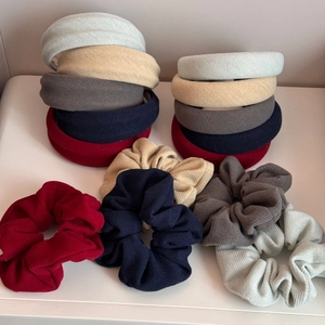 Vintage wide fabric sponge headband set in assorted solid colors for a high-volume hair look