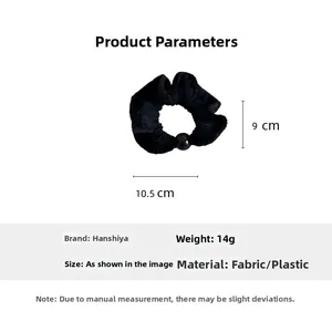 Detail showing dimensions of black velvet scrunchie with round decorative bead accent