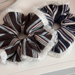 Chunky striped knit hair scrunchies with white lace trim in a stylish two-piece set
