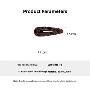Detail view of a 7.2cm plush leopard print hair clip with specific dimensions and material