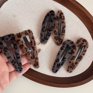 Leopard print plush hair clip set in grey and brown for women's vintage hairstyles