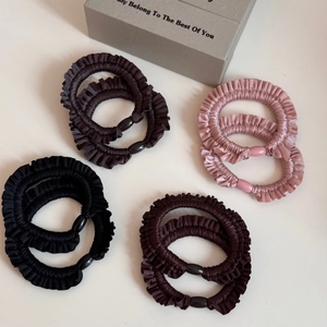 Elastic ruffled satin scrunchies in four colors with decorative pearl buckle detail