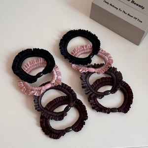 Set of ruffled satin elastic hair scrunchies with decorative oval buckles in three colors