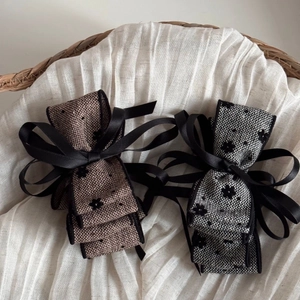 Floral flocked bow hair clips with long ribbons and polka dots in natural cream and brown