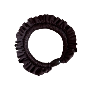 Elegant dark brown ruffled hair tie with a black oval bead on a white background