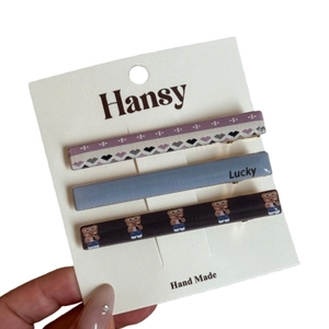 Set di 3 graziose mollette per capelli con cuori viola, scritta lucky e disegno di orso