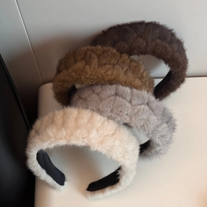 Set of four plush faux fur wide headbands in neutral autumn colors with wavy texture