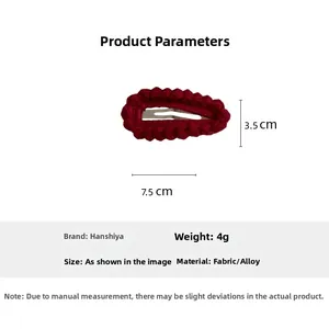 Macro view of handmade red crochet hair clip with durable metal BB clip base
