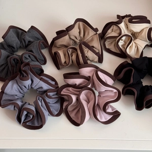 Detailed set of 6 high-elastic oversized scrunchies in contrasting dark brown edge colors