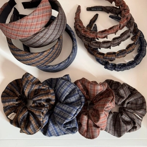 Detailed view of French fabric headband set with vintage plaid patterns and handmade labels