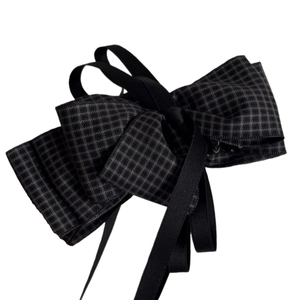 Elegant large houndstooth bow hair clip with black ribbons for women's hair styling