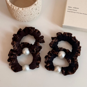 Leopard print scrunchies with white pearl accents, 4-piece set in black and brown colors