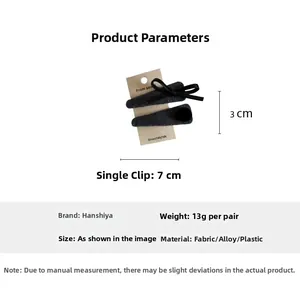 Detail view of velvet bow hair clip set with 7cm length and material specifications