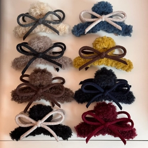 Furry bow hair claw clips set in eight assorted colors for autumn and winter hairstyling
