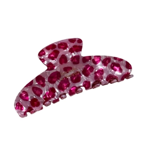 Elegant pink leopard print acetate hair claw clip with golden Barrette France text lettering
