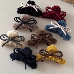 Plush bow claw clips in eight colors like burgundy and beige for autumn hair styling