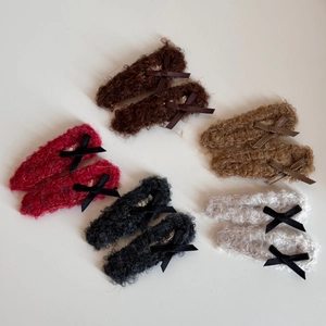 10-piece plush bow hair clip set in assorted colors with soft teddy fleece texture