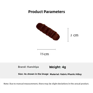 Detailed close-up of brown knitted hair clip with precise dimensions 7.5cm x 2cm