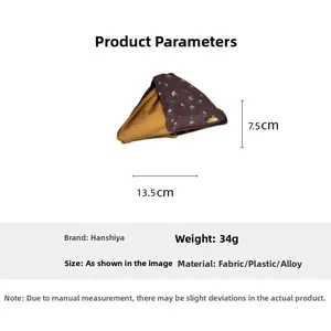 Detail view of vintage floral fabric triangle hair claw clip with dimensions 13.5cm x 7.5cm