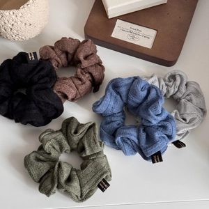Set of 5 knit ribbed scrunchies in assorted earthy colors with handmade tags